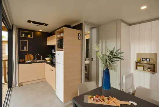 séjour cuisine gamme locative plein air chalets fabre
